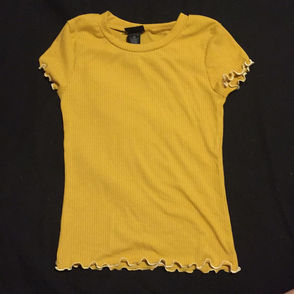 A yellow short sleeve shirt.